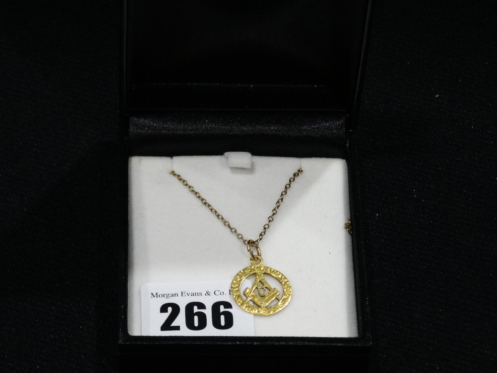 A 9ct Gold Masonic Pendant On A Gold Chain