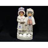 A Staffordshire Pottery Group, "Darby & Joan"