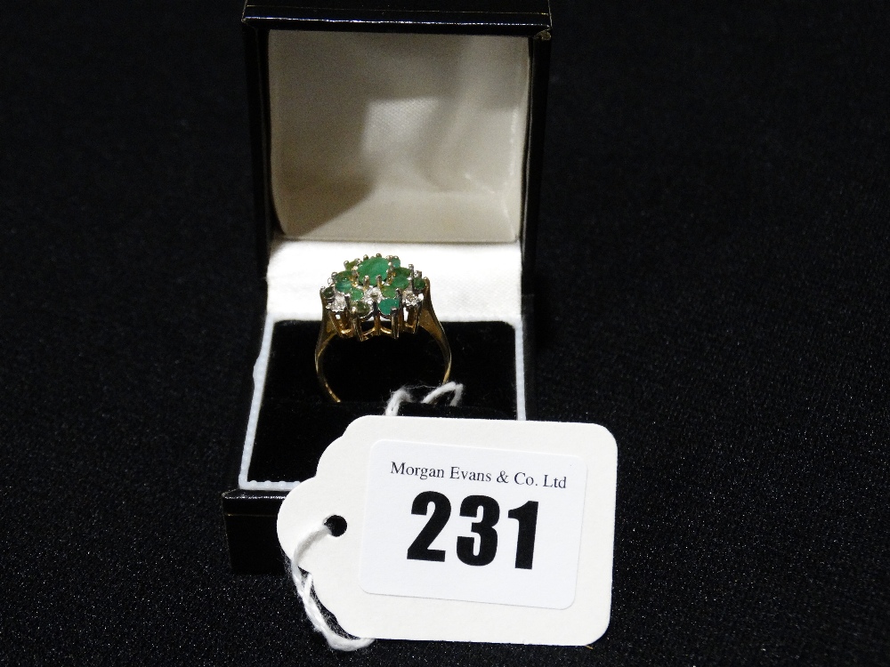 A 9ct Gold Emerald & Diamond Cluster Ring