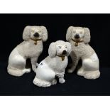 Three 19th Century Staffordshire Pottery Seated Poodles