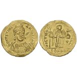 Justinian I (527-565), solidus, 527-538, helmeted bust facing with spear and shield, rev., angel