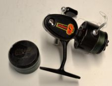 Reel - Mitchell 309 fixed spool reel stamped to the spool "US Pat 2.726.052" and retaining much of