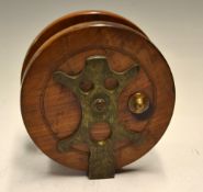 Scarce and unusual Frog Back light stained mahogany and brass big game reel: 6.5" dia with solid