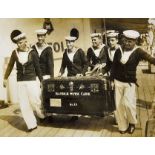 HMS Suffolk Photograph depicting crew onboard, black and white, framed measures 32x27cm approx.