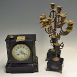French Marble Clock with garnitures having round clock face set in Black marble 22cm high, 21cm wide