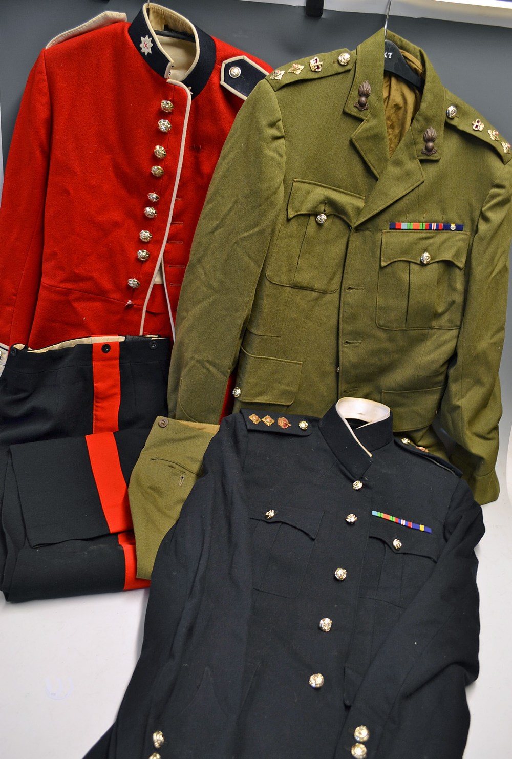 3x Military Uniforms to include red Coldstream Guards tunic and Officers 4 pocket Royal Artillery