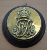 Brass Kings Crown Plaque laid to wood, measures 16cm dia'