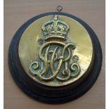 Brass Kings Crown Plaque laid to wood, measures 16cm dia'
