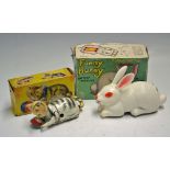 Funny Bunny - battery operated tricky action Rabbit - by Marx, together with a Joyo made in Spain