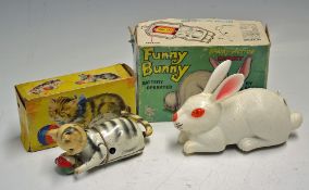 Funny Bunny - battery operated tricky action Rabbit - by Marx, together with a Joyo made in Spain