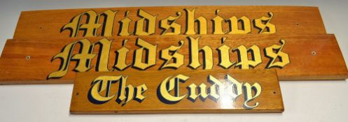 'Midships' and 'The Cuddy' Wooden Signs in gold gilt, measure 86cm in length and 46cm in length