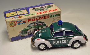 Polizei Volkswagen - Bump' N Go - battery operated made in Japan comes with original box, in good