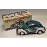 Polizei Volkswagen - Bump' N Go - battery operated made in Japan comes with original box, in good