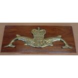 QEII Brass Royal Navy Submarine Crest mounted to wood, measures 60x26cm approx.