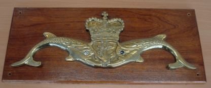 QEII Brass Royal Navy Submarine Crest mounted to wood, measures 60x26cm approx.