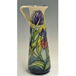 Moorcroft Pottery Tall Jug with Iris pattern measures 25cm approx. appears in good condition