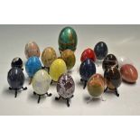 Assorted Marble Egg Selection includes various colour, plus a larger brass egg on stand, most on