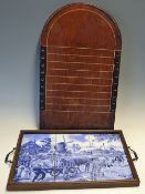 Dutch Tile 'The Milker' Scene Tray with handles wither side, together with a Shove Halfpenny