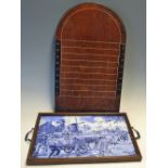 Dutch Tile 'The Milker' Scene Tray with handles wither side, together with a Shove Halfpenny