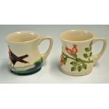 2x Moorcroft Pottery Mugs one marked 1993 with floral design the other with no date cipher