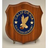 America Rugby Shield: embossed shield inscribed "California Bald Eagles Rugby" mounted on a