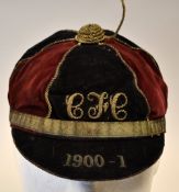 1900-1 Rugby Honours Cap: six-panel black and maroon honours cap with dulled braid trim, lacking