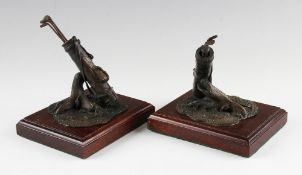 Pair of bronze golfing gentleman's desk paper weights - signed by the artist R.T Pearce both mounted