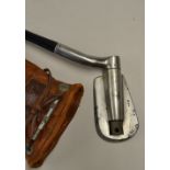 Miracle adjustable iron c/w key and a leather head cover