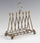 Silver plated golfing toast rack - with 7x crossed golf clubs and mounted on smooth guttie ball