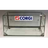 Corgi Toys Glass Display Cabinet with glass sides and front with shelf to inside and two sliding
