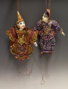 2x Oriental Wooden Puppets appear hand painted in traditional red and blue dress with sequin