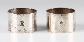 Pair of Silver RAF Napkin Rings stamped with a crown above AM (2)