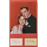 Autographs - Gene Kelly and Debbie Reynolds Signed Display with two cuttings below a colour print