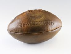 New Zealand leather rugby ball - a full size brown leather rugby ball embossed with New Zealand Fern