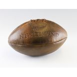 New Zealand leather rugby ball - a full size brown leather rugby ball embossed with New Zealand Fern