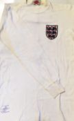Colin Bell Match Worn England International Football Shirt white long sleeve shirt with a red number