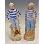 Pair of Victorian Continental Ceramic Football Figures in blue and white hooped shirts complete with