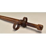 c. 1920's Pogo Stick - made from wood and steel inner spring with circular foot supports at