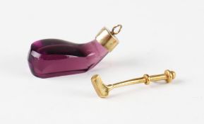 18ct gold golf club charm (wt. 1.3gms) and purple coloured glass golf club c/w silver plated neck