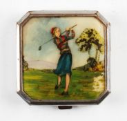 Lady Golfer's powder compact - c/w hinged lid with painting on celluloid of a young lady golfer -