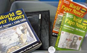 Selection of World Paper Money Price Guides plus empty albums and album pages and a magnifier