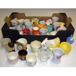 Selection of Egg Cups to include a variety of ceramic styles and shapes, with animals and cartoon