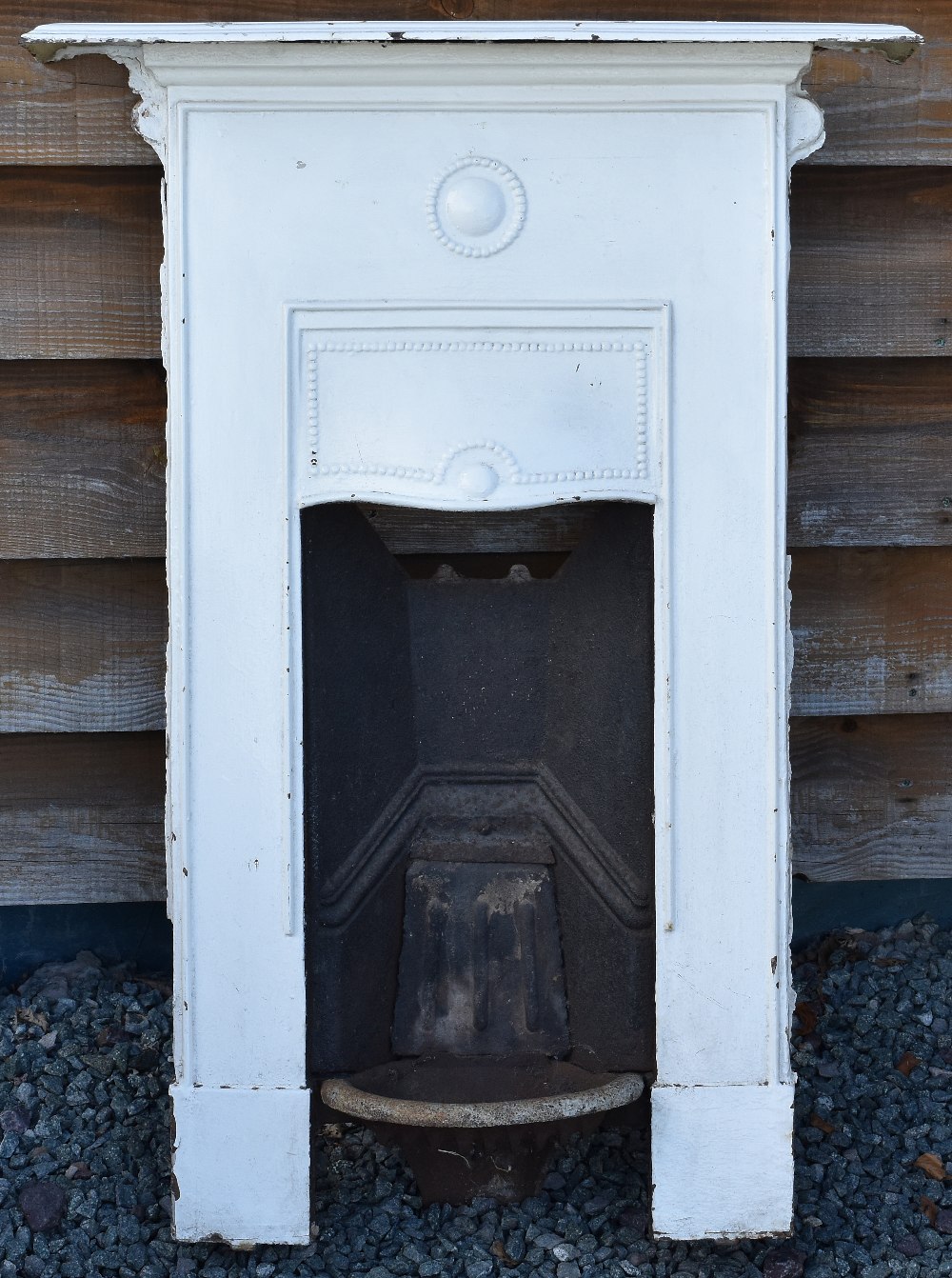 Victorian Fireplace a cast iron fireplace in white, measures 64x89cm approx. (Please Note: posting