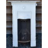Victorian Fireplace a cast iron fireplace in white, measures 64x89cm approx. (Please Note: posting
