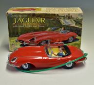 Marx Toys Battery Operated Jaguar with remote control, in red, having head lights and horn, comes