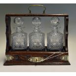 3x Cut Glass Decanters and Tantalus with EPNS fittings and marks, handle to top, comes with key,