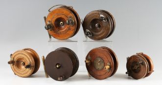 Collection of Wooden and Brass or Chrome star/strap back reels (6): ranging from 3" to 4.5" - one