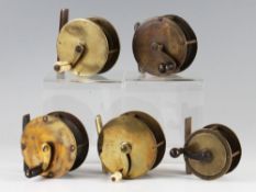 Collection of various brass crank wind reels (5): one stamped with Allcocks Stag Trade mark to the