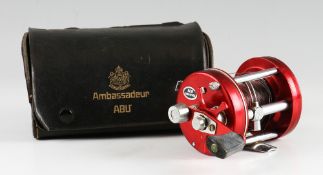 Abu Ambassadeur 6500 multiplier reel: red finish with 3 screw smooth end plate, foot stamped 790501,