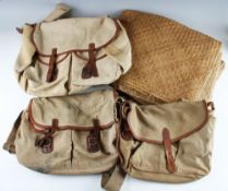 Fishing accessories: A Hardy Test fly fishers canvas bag with leather trim, twin stud fastening